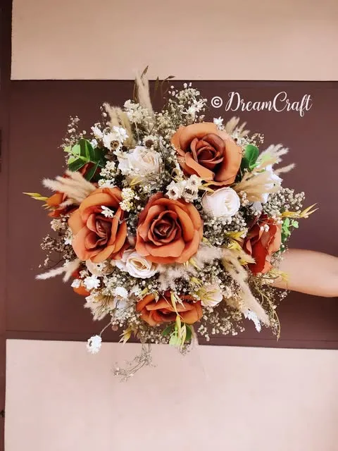 Terracotta rose and pampas bridal bouquet